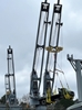 Two Telescopic beams lifting a truck.