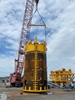 Spreader Beam and End Cap Kit lifting a suction pile!
