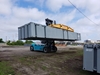 A Tandemloc Forklift Container Spreader Frame lifting a container!