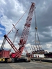 Three Tandemloc AT14 Spreader Beams making a lift at a port.