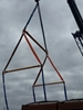 A close up of 3 Tandemloc Spreader Beams making a lift!