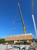 Tandemloc End Caps being utilized to lift a large unit.